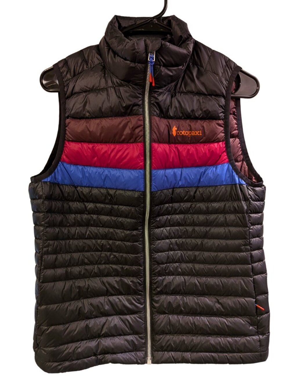 cotopaxi Women's Quilted Jacket in Black with Brown & Orange Branding